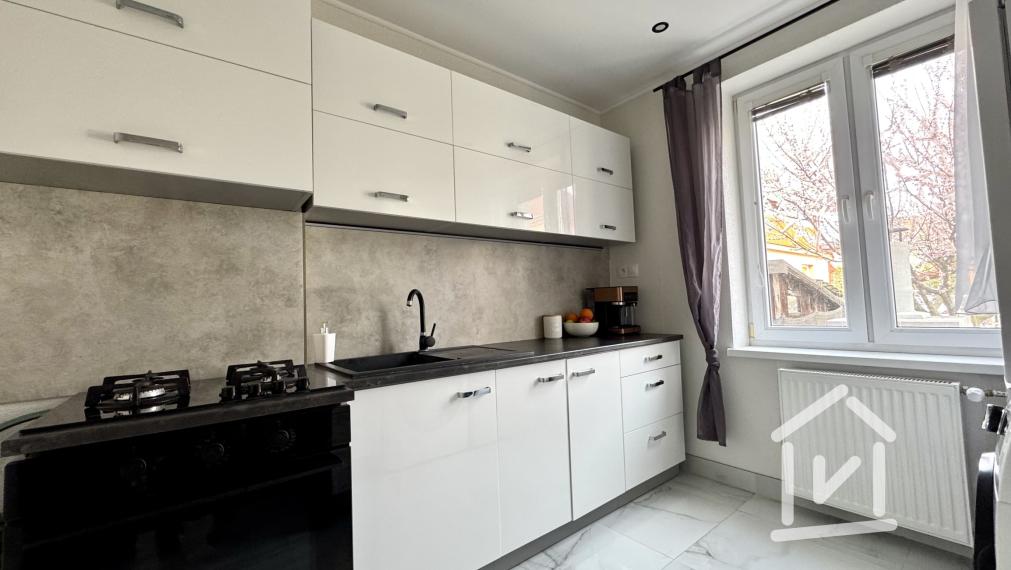 4 izbový rodinný dom s garážou v centre mesta, Partizánske