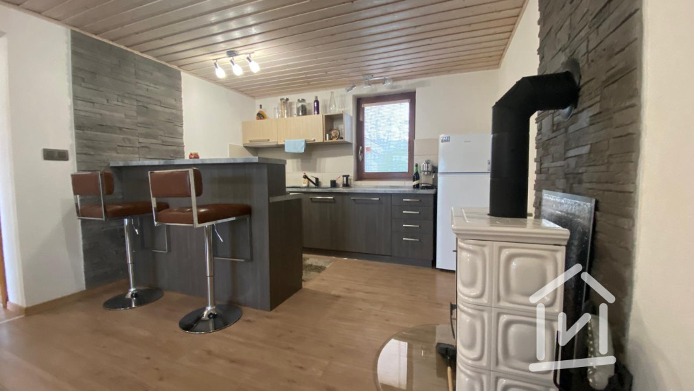 ŠTÝLOVÁ CHATA V NITRIANSKOM RUDNE S TERASOU A SAMOSTATNOU GARÁŽOU